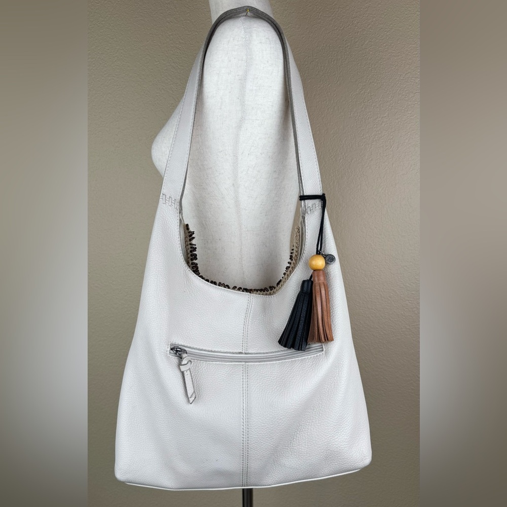 The Sak Huntley Hobo Bag. Ecru.Soft, Pebbled Leather w/Fabric Turquoise Interior - Picture 2 of 16